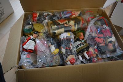 a box full of toys and other items in it