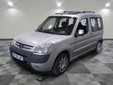 a picture of a silver van parked in a room