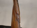 a close up of a wooden sculpture of a bird