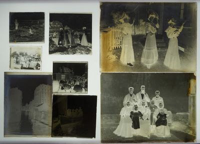 an old black and white photo of a group of people posing for a picture