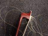 a piece of wood that has been stitched together with thread