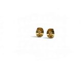 a pair of gold earrings on a white background