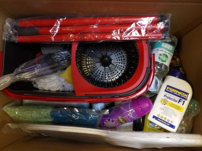 a box full of cleaning supplies and cleaning supplies