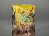 an image of a vase with a painting on it on a gray surface