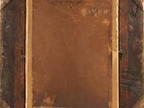 an old wooden frame with a picture hanging on it ' s side