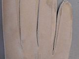 leather gloves with stitching on the palm of one hand