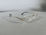 a pair of glasses sitting on top of a table