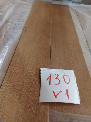 a piece of wood on the floor with a price tag on it