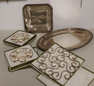 four coasters that are sitting on a table