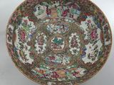 an image of a bowl with flowers and birds on it