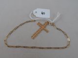 a gold chain with a cross and a tag on it