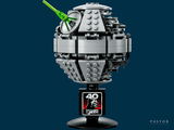 a lego death star with a green light on top of it