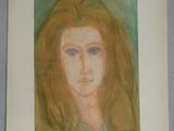 tableau représentant le visage d'une femme aux longs cheveux et aux yeux bleus