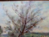 un tableau représentant des vaches paissant dans un champ près d'un arbre