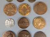 a close up of a bunch of coins sitting on top of a table