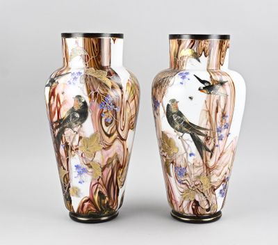 pair of vases decorated with birds and flowers on a gray background