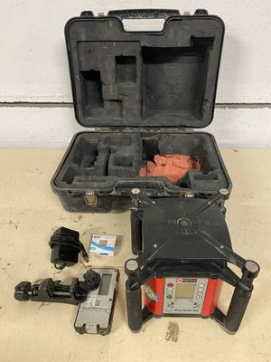 an image of a tool box with a drill and other tools