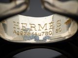 a close up of a ring with a name engraved on it