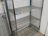 three metal shelves that are next to each other in a room