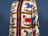 an image of a shirt on a mannequin stand with a blue background