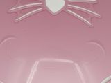 a pink bowl with a cat design on it