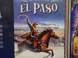 two books on a table with a picture of a man riding a horse