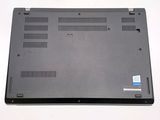 a black laptop that is sitting on a white table