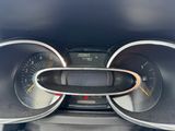 a close up of a car dashboard with a speedometer and gauges