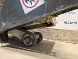 a sign on the back of a truck that says no skateboarding