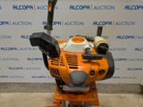 a small machine that is sitting on the ground