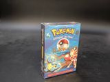 a small box of pokemon cards sitting on a table
