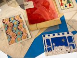 many cards on the table with drawings on them