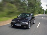 a blurry photo of a car driving down the road