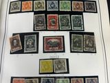 an open book with a bunch of different stamps on it
