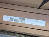 a box with a barcode on it sitting on a shelf