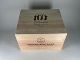a close up of a wooden box with a label on it