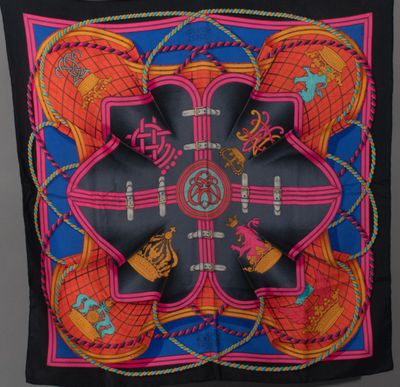 an image of a black and pink scarf with a cross on it