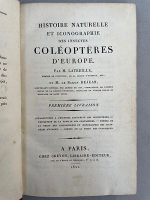 an open book that has a picture of a bird on it