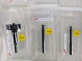 a lot of different types of pens and pencils in the package