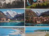 four postcards of a view of a mountain town and a body of water with mountains in the background