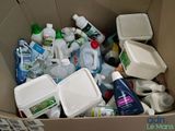 a cardboard box full of cleaning products and cleaning products