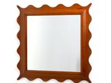 une image représentant un miroir accroché au mur
