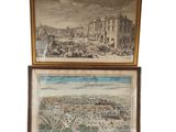 two framed pictures of a view of a city and a picture of a town
