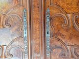 a large wooden door with ornate carvings on it