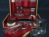 an image of a red leather case with tools in it