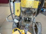 a close up view of a machine with a hose attached to it