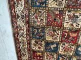 a very large rug with many different designs on it
