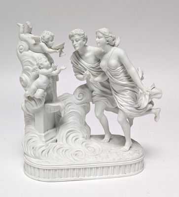 a white statue of a man and a woman on a boat