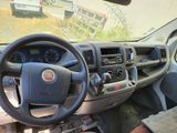 a picture of a car dashboard with a steering wheel