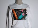 long sleeved t - shirt with a picture of flowers and a bottle of water on it